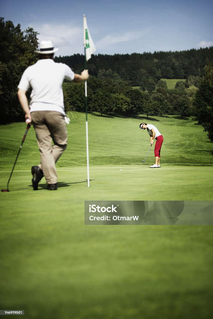 Zwei Golfspieler auf dem Grün - Lizenzfrei Aktiver Lebensstil Stock-Foto