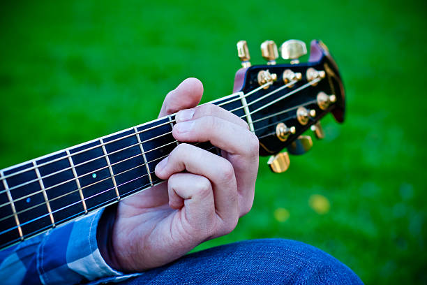 Man playing the guitar stock photo