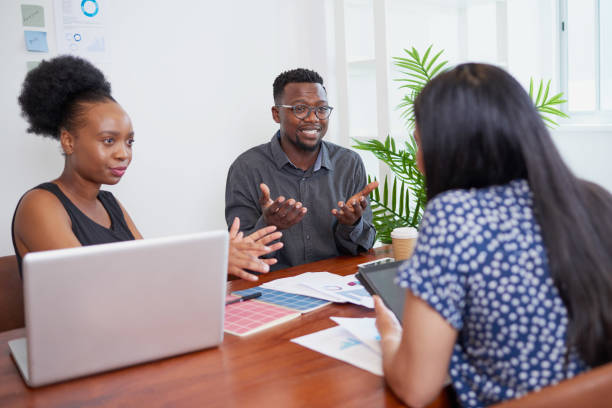 istock Team of diverse colleagues have heated discussion debate, boardroom table brainstorm 1469197456