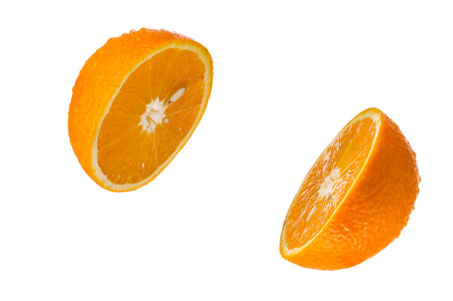 half ripe oranges isolated  on a white background