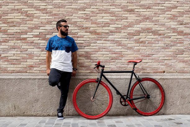 istock Casual guy with red bike 1469201935