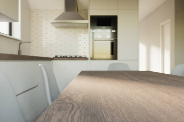istock Dining table with kitchen background - 3d rendering with shallow depth of field and soft focus. Copy space for product, template and kitchen or culinary mock up 1469204474