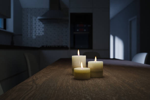 istock Generic kitchen interior at night with moon light and burning candles in 3d rendering. Digital illustration of contemporary dining room at home, mock up with copy space 1469204477