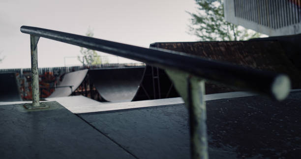 istock Empty rail for training on skate board at skate park colorful graffiti wall. 1469205217