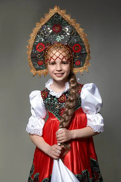 A little girl in the Russian national costume