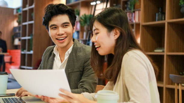 istock Man and Woman working together 1469206491