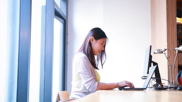 istock Chinese woman working at Office 1469207836