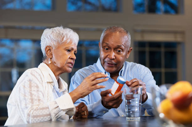 istock Senior African-American couple, taking medication 1469207890