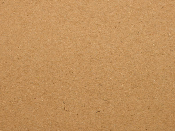 istock Brown paper parchment background with fibers 1469214475