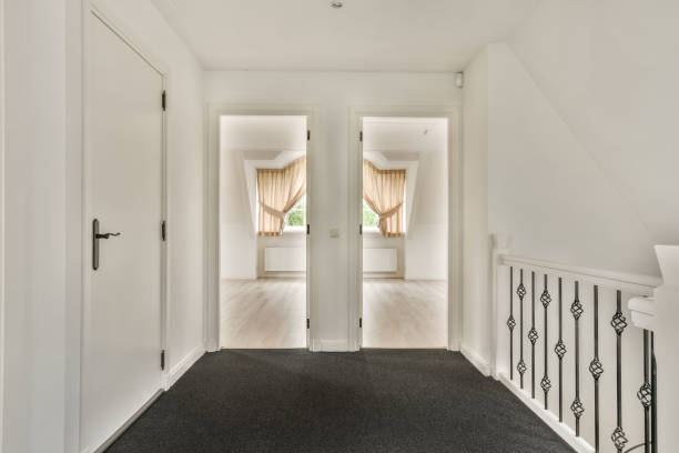istock Light narrow hallway with staircase 1469216318