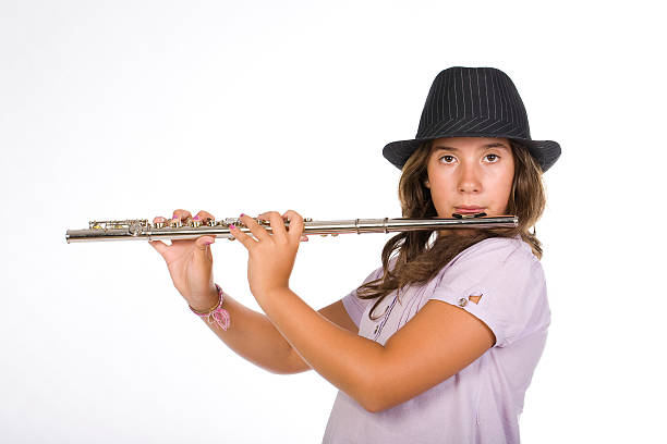 istock young girl playing the flute 146921831