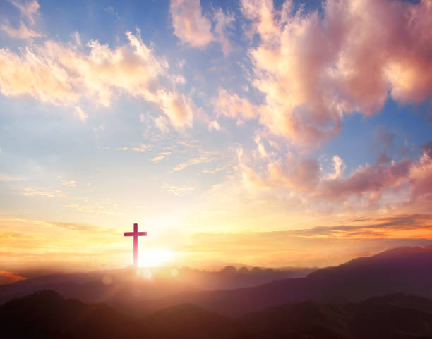 religious concept,The cross of God in the rays of the sun stock photo