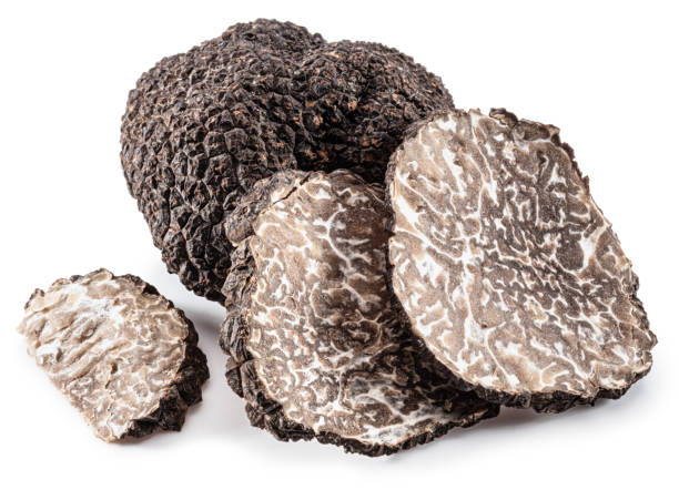istock Summer truffles and truffle slices isolated on white background. Close-up.. 1469220769
