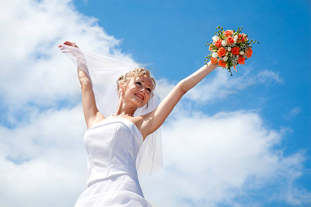 istock young beautiful  bride with wedding bouque 146922163
