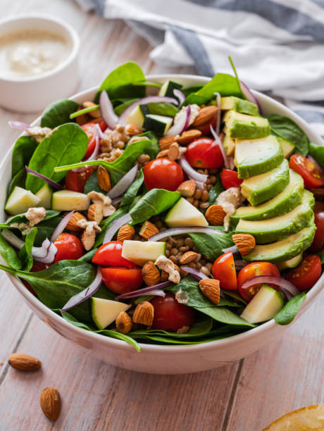 istock Healthy salad with lentils, avocado and vegetables 1469225126