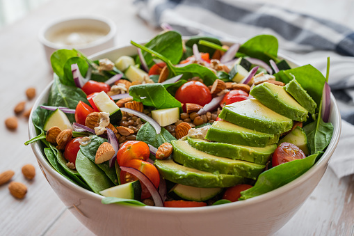 Table presentation of a healthy salad