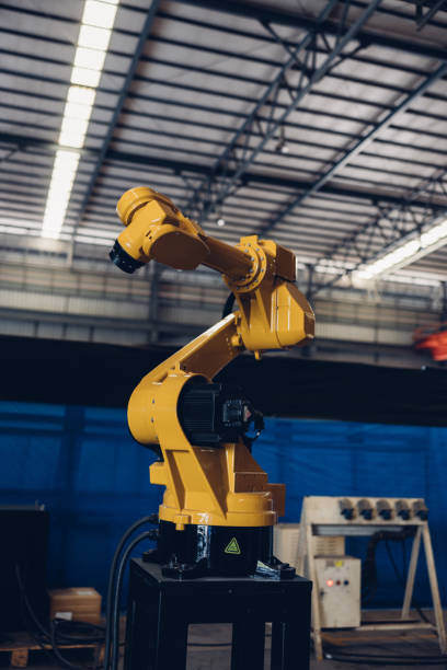 istock New Generation Robotic Arm Ready for Work on a Production Line. New robot arm  for the production line of industrial factory. Robot arm manipulator at the factory. Industrial automation technology. 1469230212