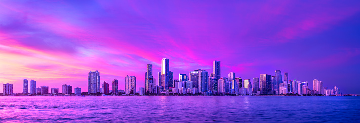 the skyline of miami during a sunset