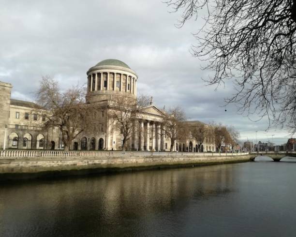 Four Courts (Irish: Na Centre Cúirteanna) is Ireland's most prominent courts building, located on Inns Quay in Dublin stock photo