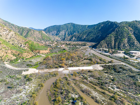 Aerial view of San Gabriel River and housing development.