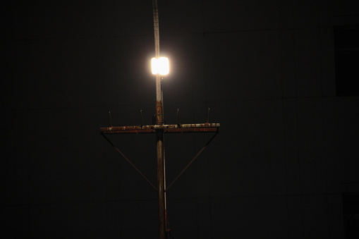 This lamp post is a useful tool at night. to illuminate a dark place so that it can be seen.