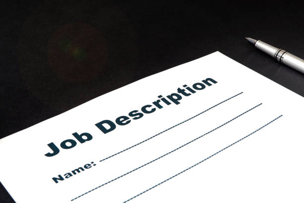 istock Blank form Job description with pen on black background. 1469232641