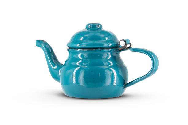 istock Vintage metal old blue kettle isolated on white background 1469235427