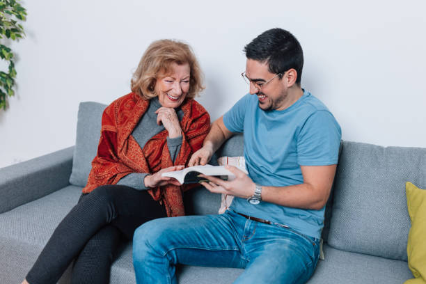 istock Caring Volunteers Connect with Seniors Through Reading 1469238433
