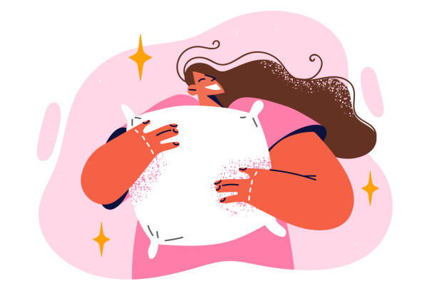 istock Positive woman hugging pillow in early morning not wanting to get out bed or refusing to go to work 1469239830