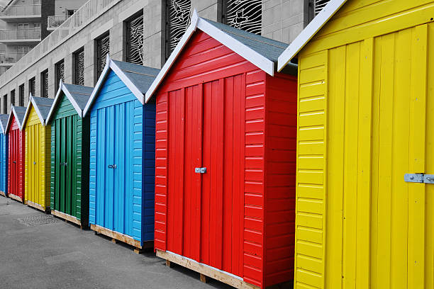 coloured huts these beach huts are situated in boscombe Dorset boscombe photos stock pictures, royalty-free photos & images