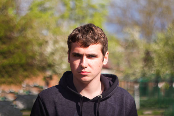 istock Defocus young man with a problem crying. Portrait young man on vintage background. Sad young man. 20s years. Handsome man outdoors portrait. Lifestyle. Student. Out of focus 1469244305