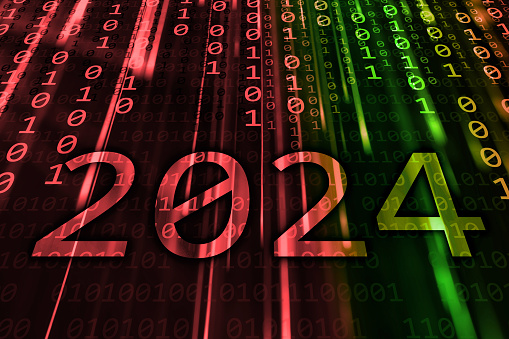 2024 text written on a multi colored flowing binary code background. New Year 2024 celebration concept.