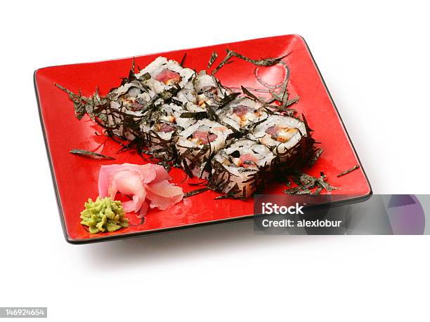 Rolls With Seaweed Salmon And Octopus In Red Squared Plate Stock Photo - Download Image Now