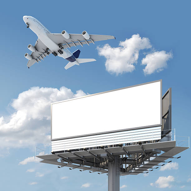 istock blank billboard with airplane on the sky 146924672