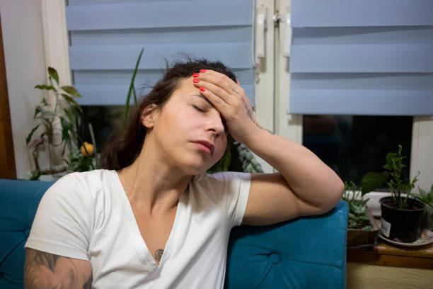 istock Woman  suffering from pain 1469247407