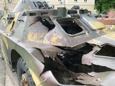 Soviet amphibious armored personnel carrier, BTR-60P. Destroyed military equipment. War. Broken Russian BTR in Kiev. Traces of explosion of military equipment. Ukraine. War, Russia and Ukraine