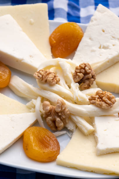 istock Assortment of cheese on the plate in bulk. 1469253052