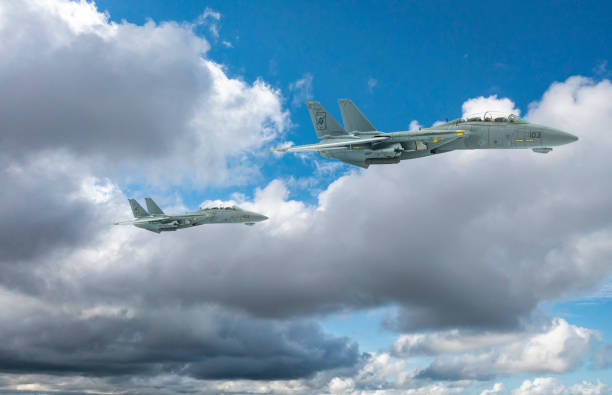 istock Jet aircrafts flying over the clouds. 1469253567