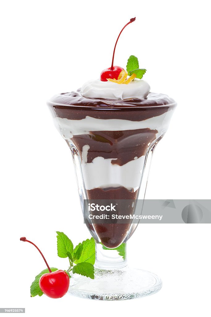 Chocolate sundae A layered chocolate sundae, with whipped cream and cherries  On a white background. Chocolate Stock Photo