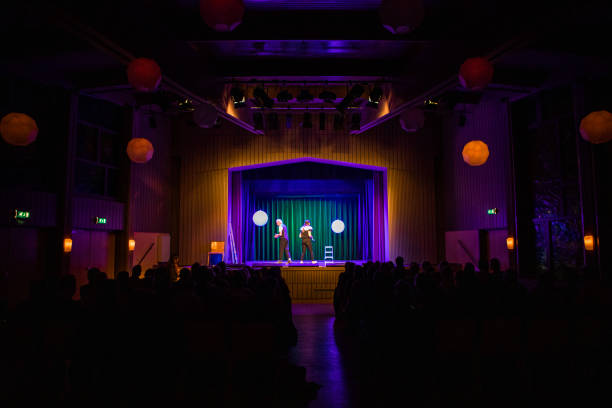 istock Small group of actors on stage during their performance 1469257947