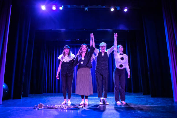 istock Four actors on stage taking the applause 1469259418