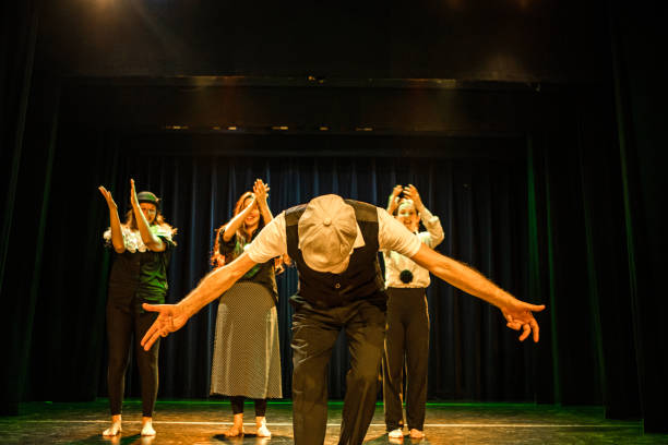 istock Four actors on stage taking the applause 1469259465