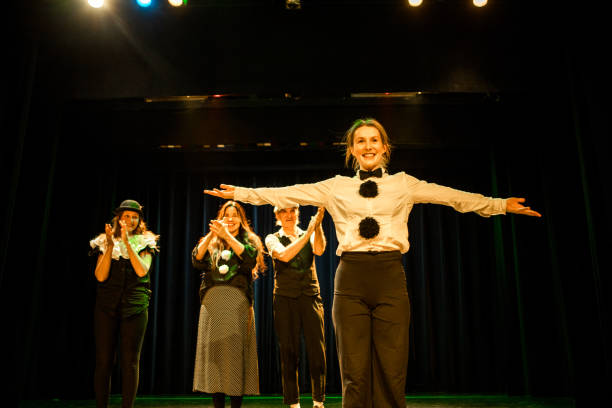 istock Four actors on stage taking the applause 1469259466