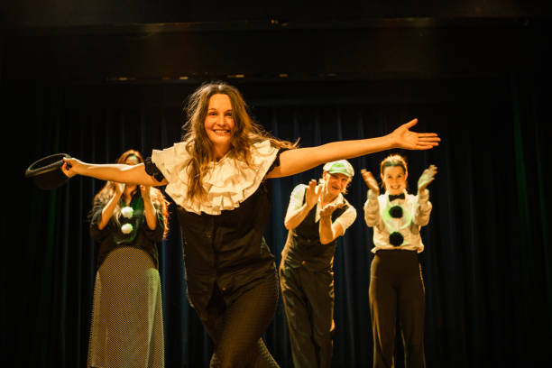 istock Four actors on stage taking the applause 1469259511