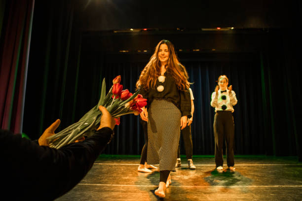 istock Four actors on stage taking the applause 1469259553