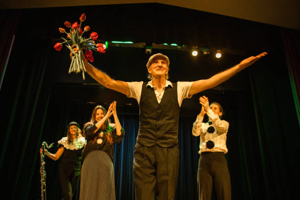 istock Four actors on stage taking the applause 1469259562