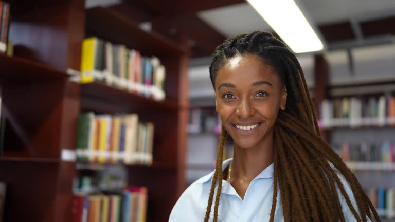 Portrait of a young woman in the library