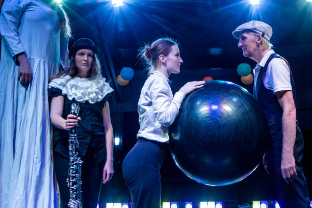 Small group of actors on stage during the performance