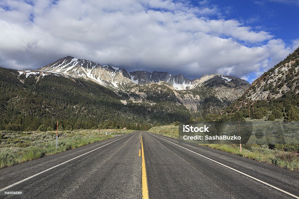 Highway to the mountains Highway toward Tioga Pass and entrance to Yosemite National Park on the eastern side of Sierra Nevada mountains, California Adventure Stock Photo