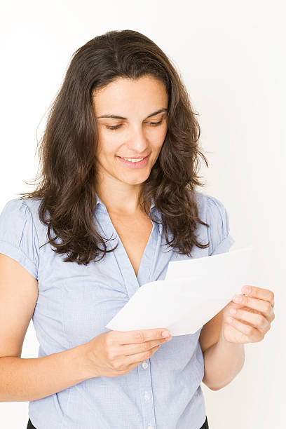 istock Woman opening a letter 146926982